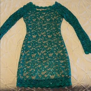 Green sequin long sleeved dress